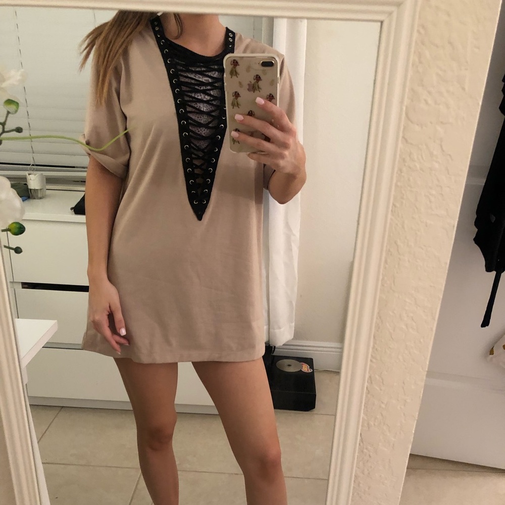 Beige oversized tee with black lace up front